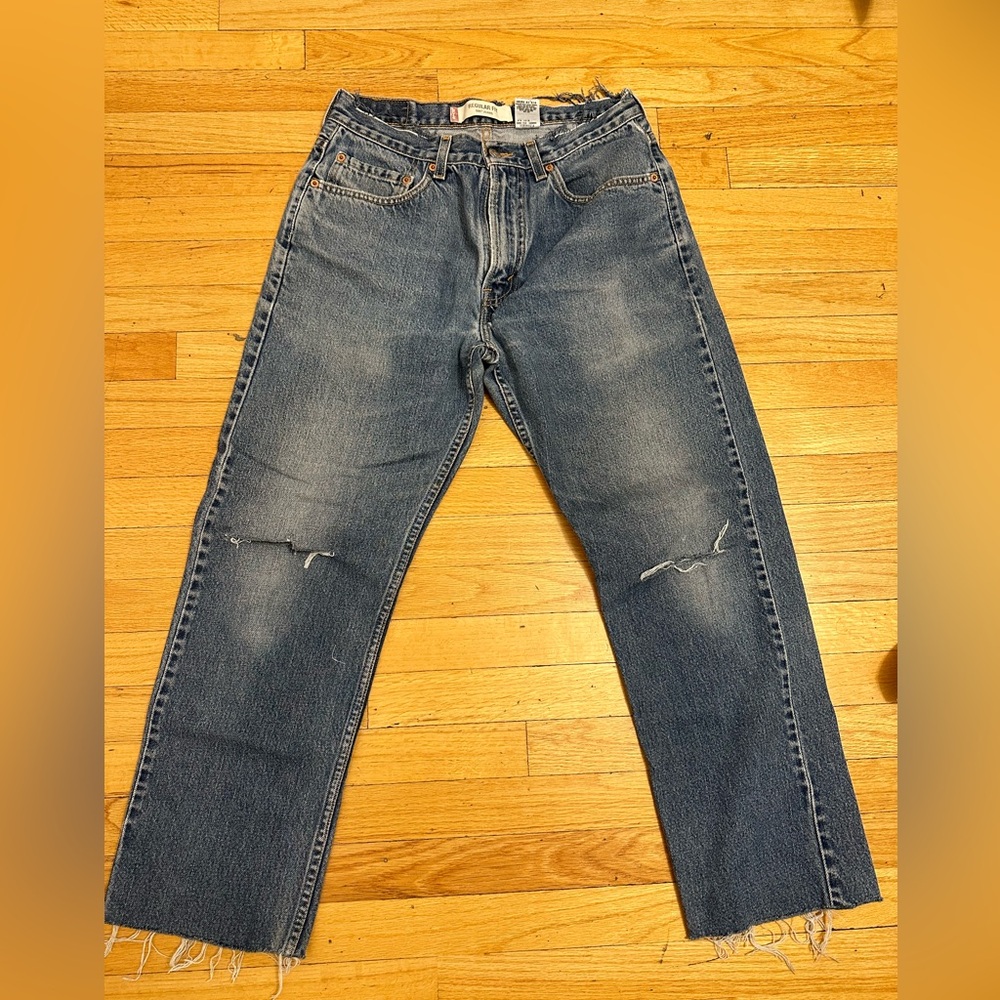 Dis stressed Levi’s Denim Jeans. Size Medium